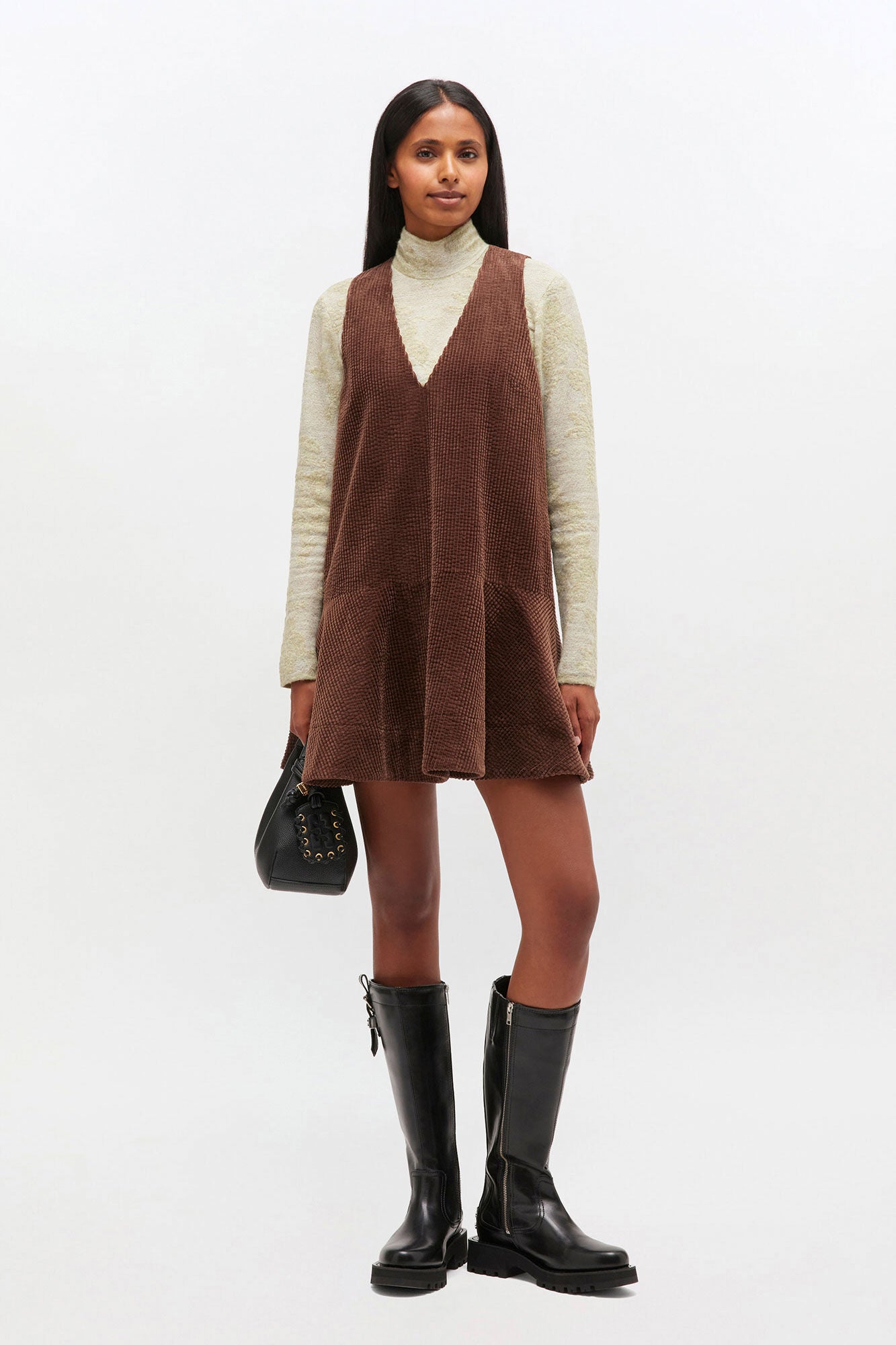 corduroy mini dress Longhorn Elevate your seasonal style with this versatile piece that pairs well with both boots and heels. Ganni Rain Drum Brown Corduroy