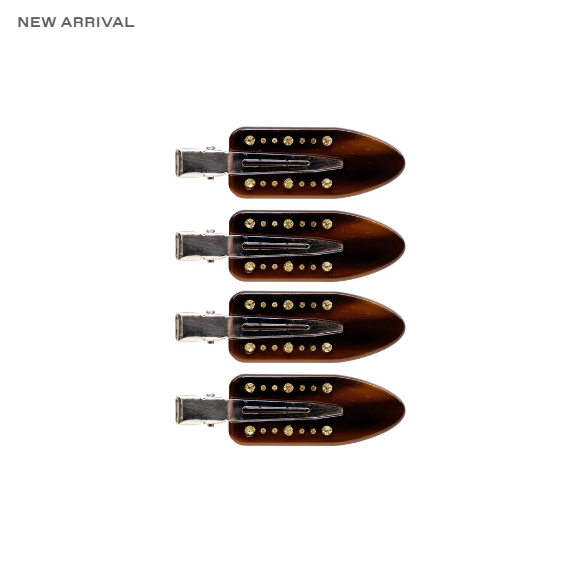 POPSTAR CLIPS IN AMBER GLOW